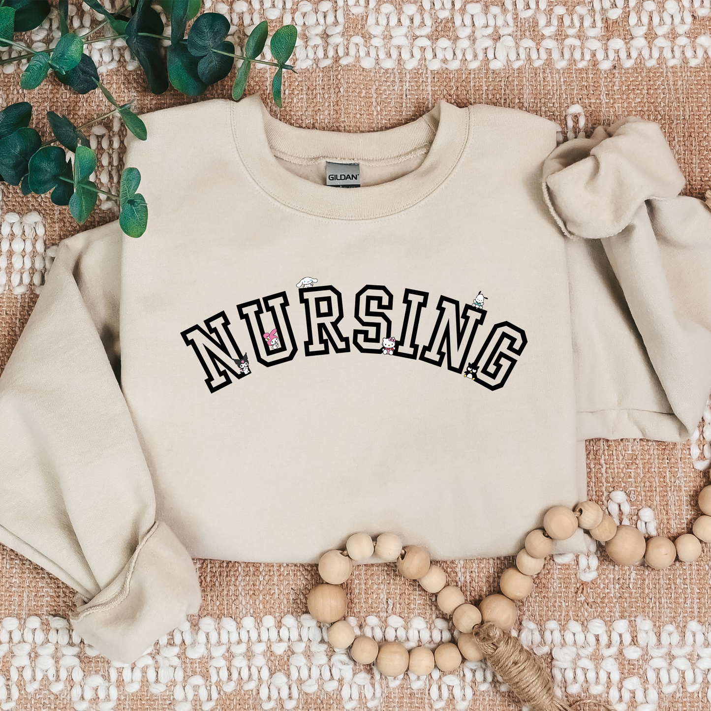 Black-NURSING-Varsity- Kawaii-Characters -Cozy Sweatshirt