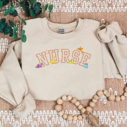 Dinosaur-Nurse-Varsity-Tan-Cozy Sweatshirt