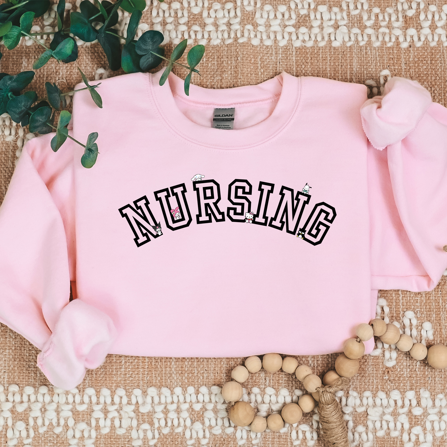 Black-NURSING-Varsity- Kawaii-Characters -Cozy Sweatshirt