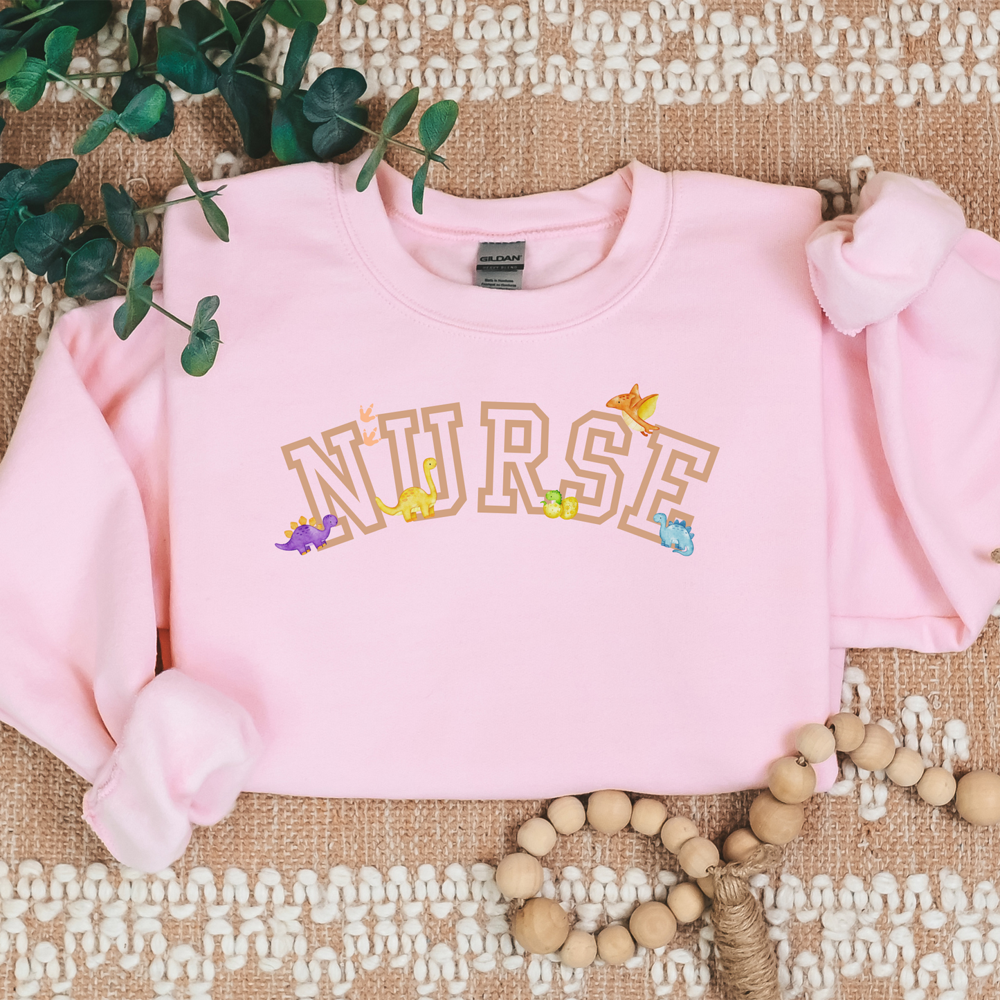 Dinosaur-Nurse-Varsity-Tan-Cozy Sweatshirt