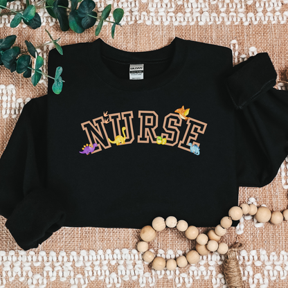 Dinosaur-Nurse-Varsity-Tan-Cozy Sweatshirt