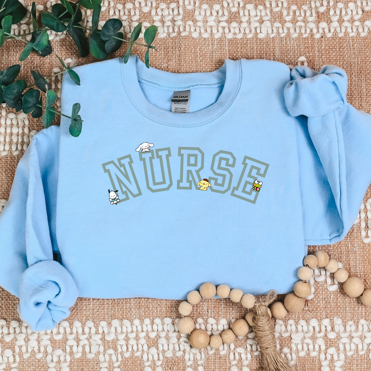 MINT- Varsity Nurse Kawaii Characters Cozy Sweater