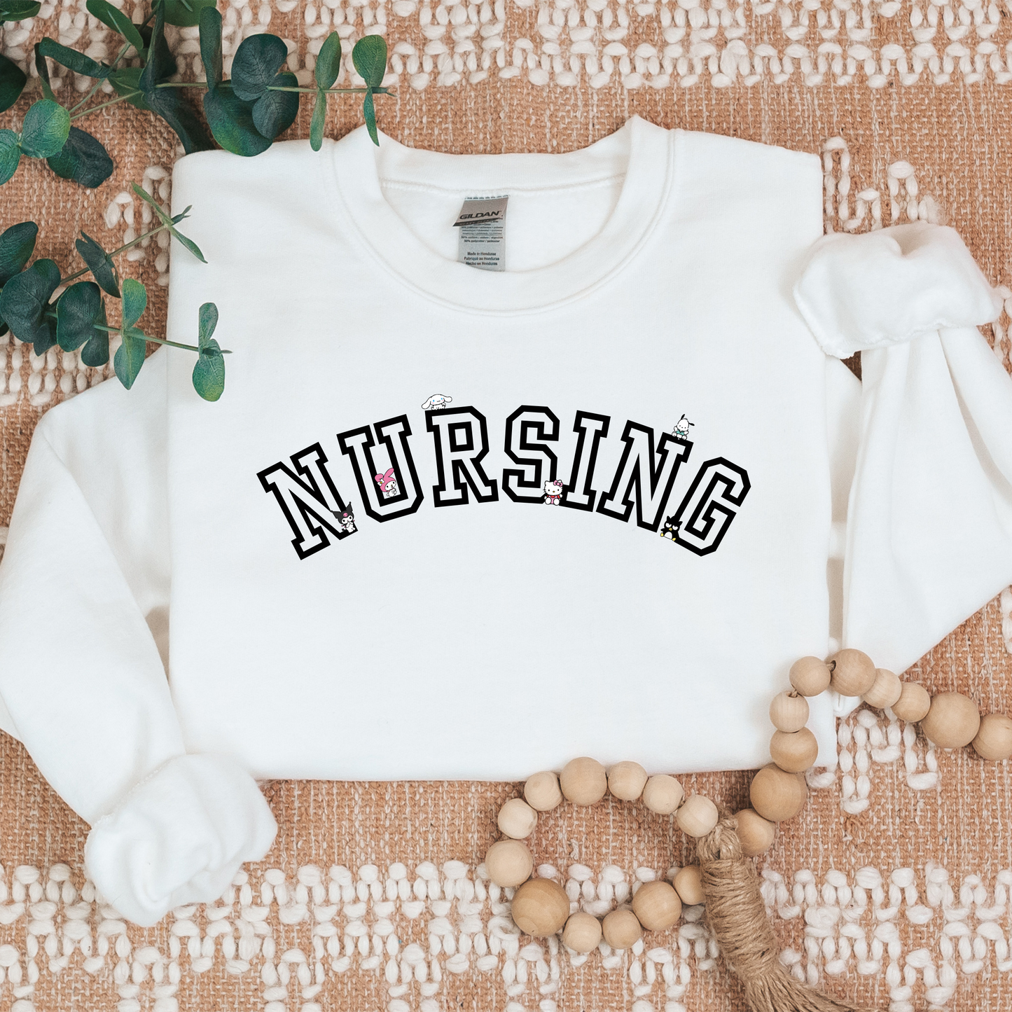 Black-NURSING-Varsity- Kawaii-Characters -Cozy Sweatshirt