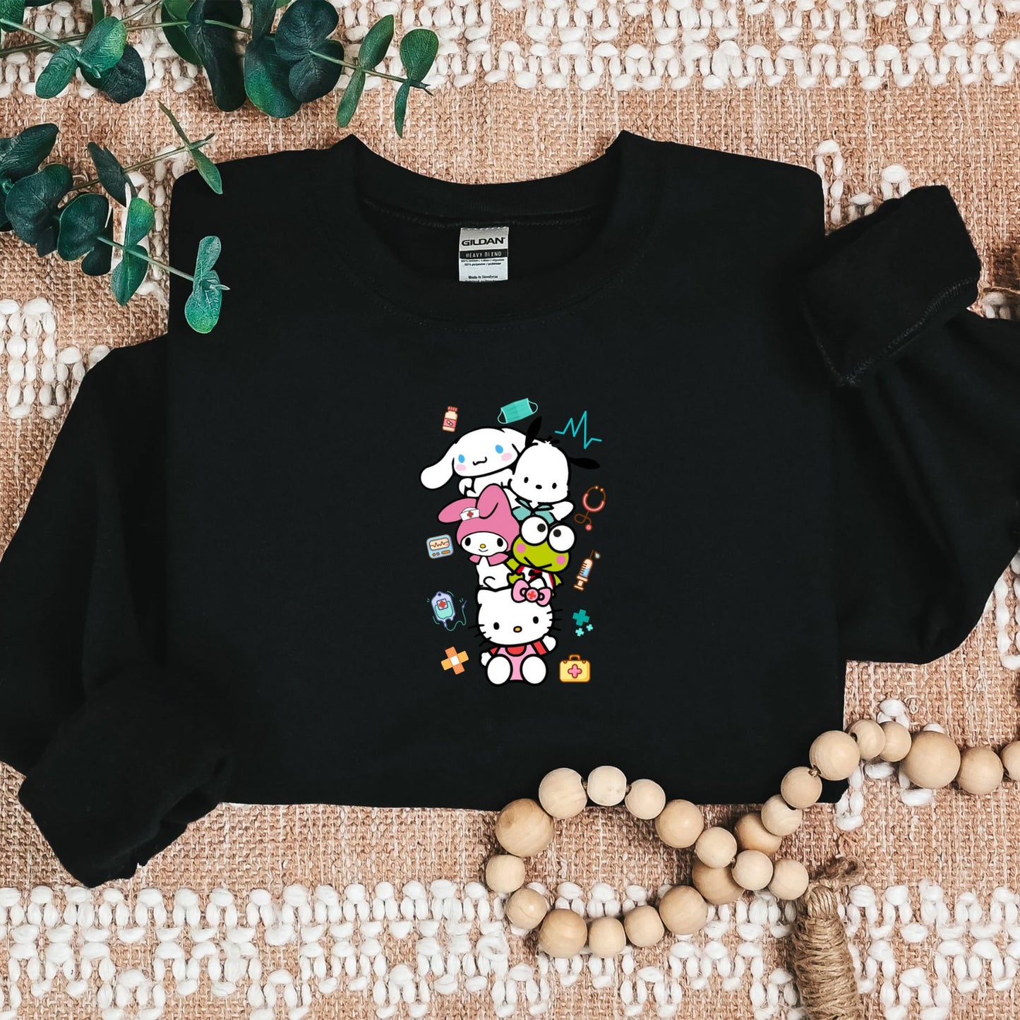 Stacked Medical Kitty and Friends Cozy Sweater